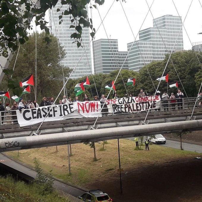 Banner Protest Demands UK Stop Arming Israel Over Gaza