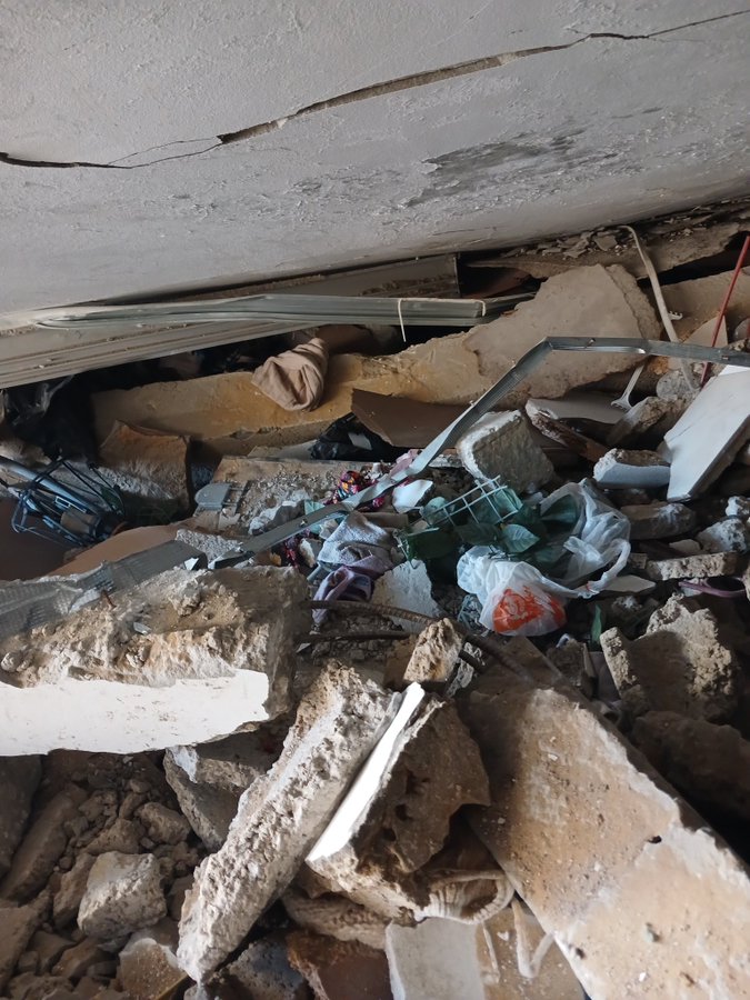 Searching for memories and belongings in home rubble