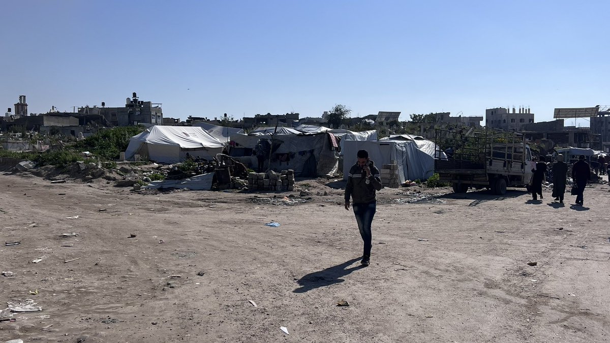 Displaced Palestinians from northern Gaza cities shelter in Gaza City cemeteries