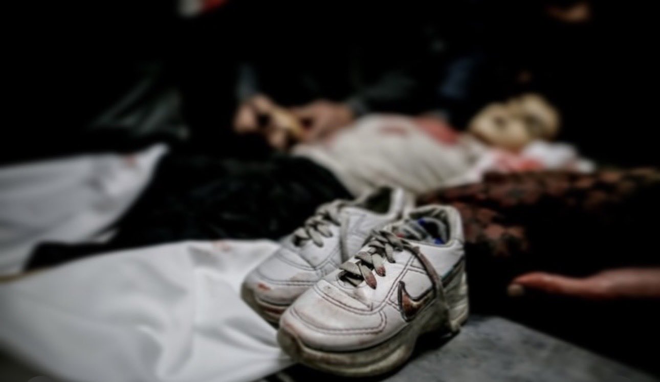 Father Grieves Child in Gaza’s Al-Nafaq Street Devastation