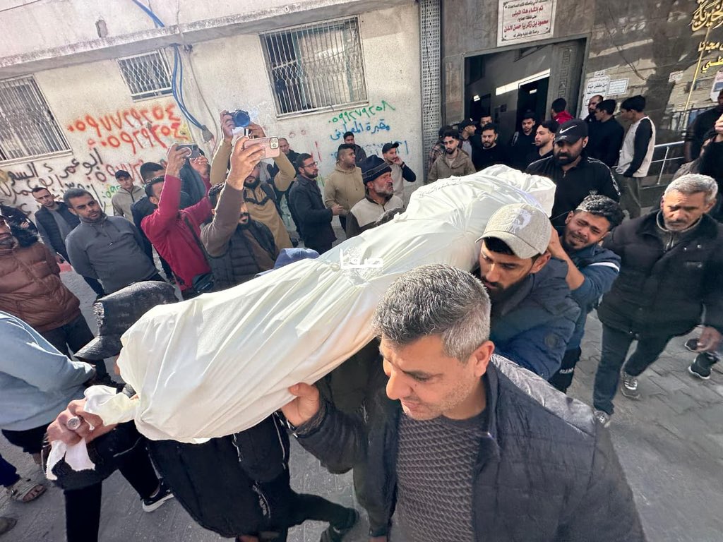 Gaza residents bid farewell to four Palestinians killed in airstrike