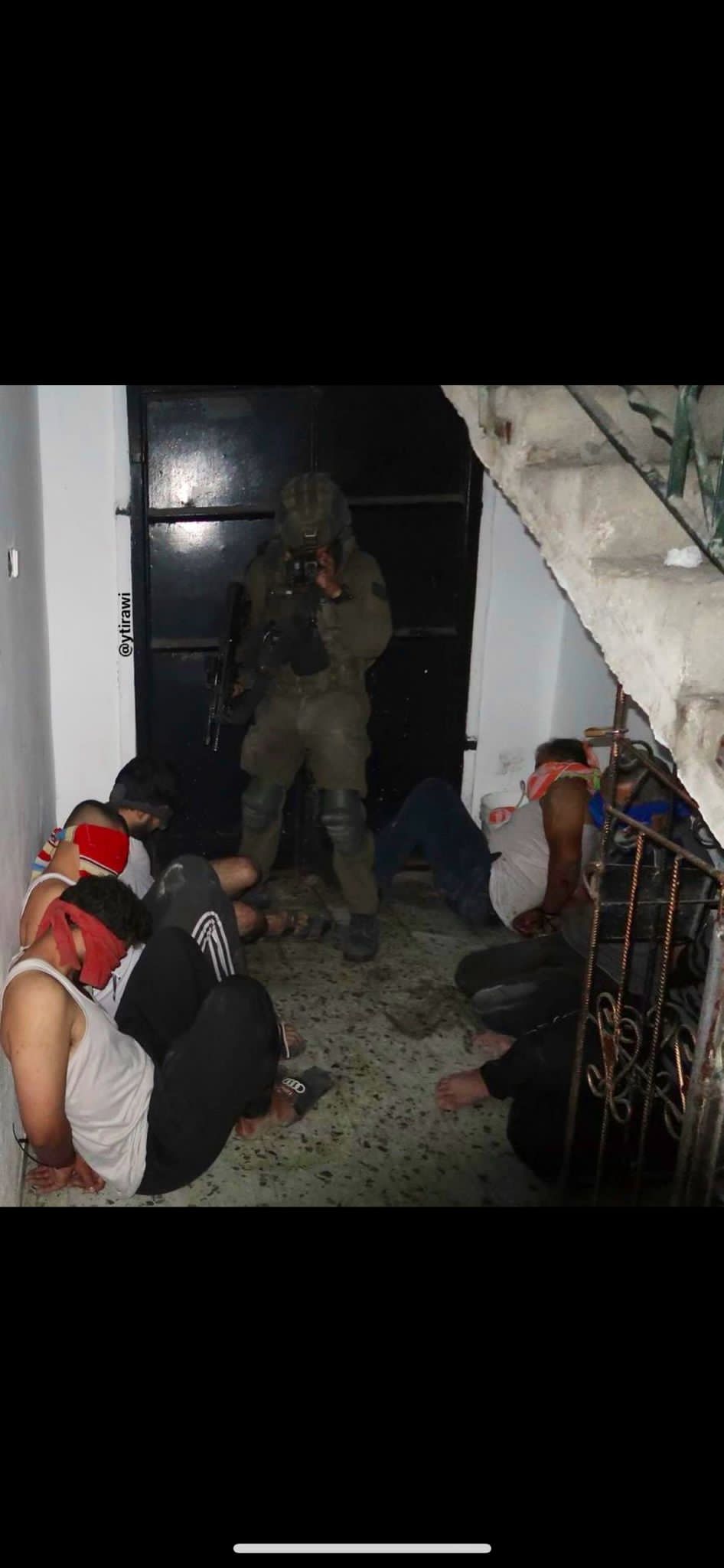 IOF Soldier Posts Photo of Blindfolded Handcuffed Palestinians