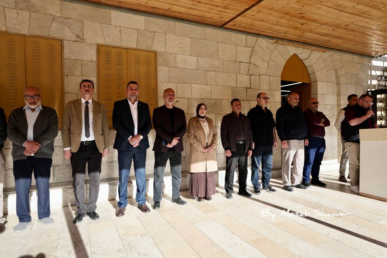 Shrine of remembrance with Palestinian symbols and portrait