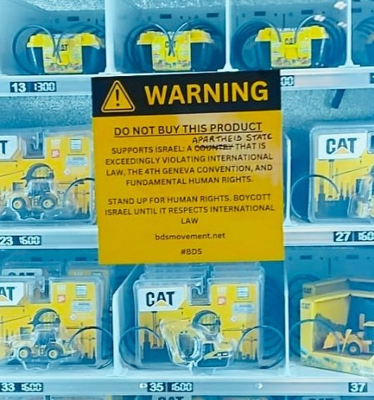 Activists Protest Caterpillar Bulldozer Use in Sydney