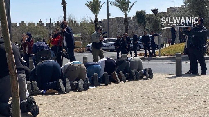 Worshippers perform Friday prayers outside Al-Aqsa amid closure