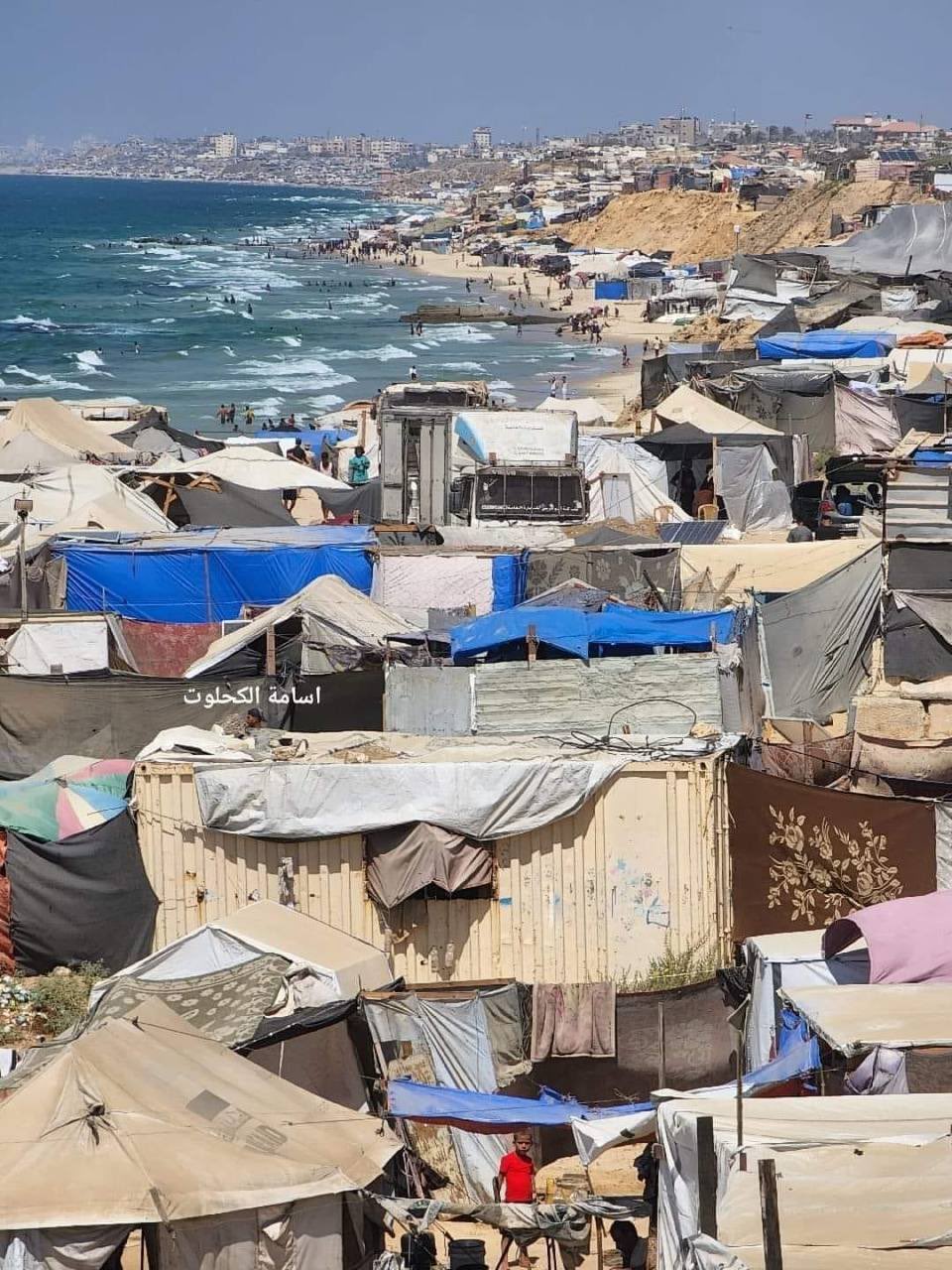 Displaced Palestinians Crowding Khan Younis Beach