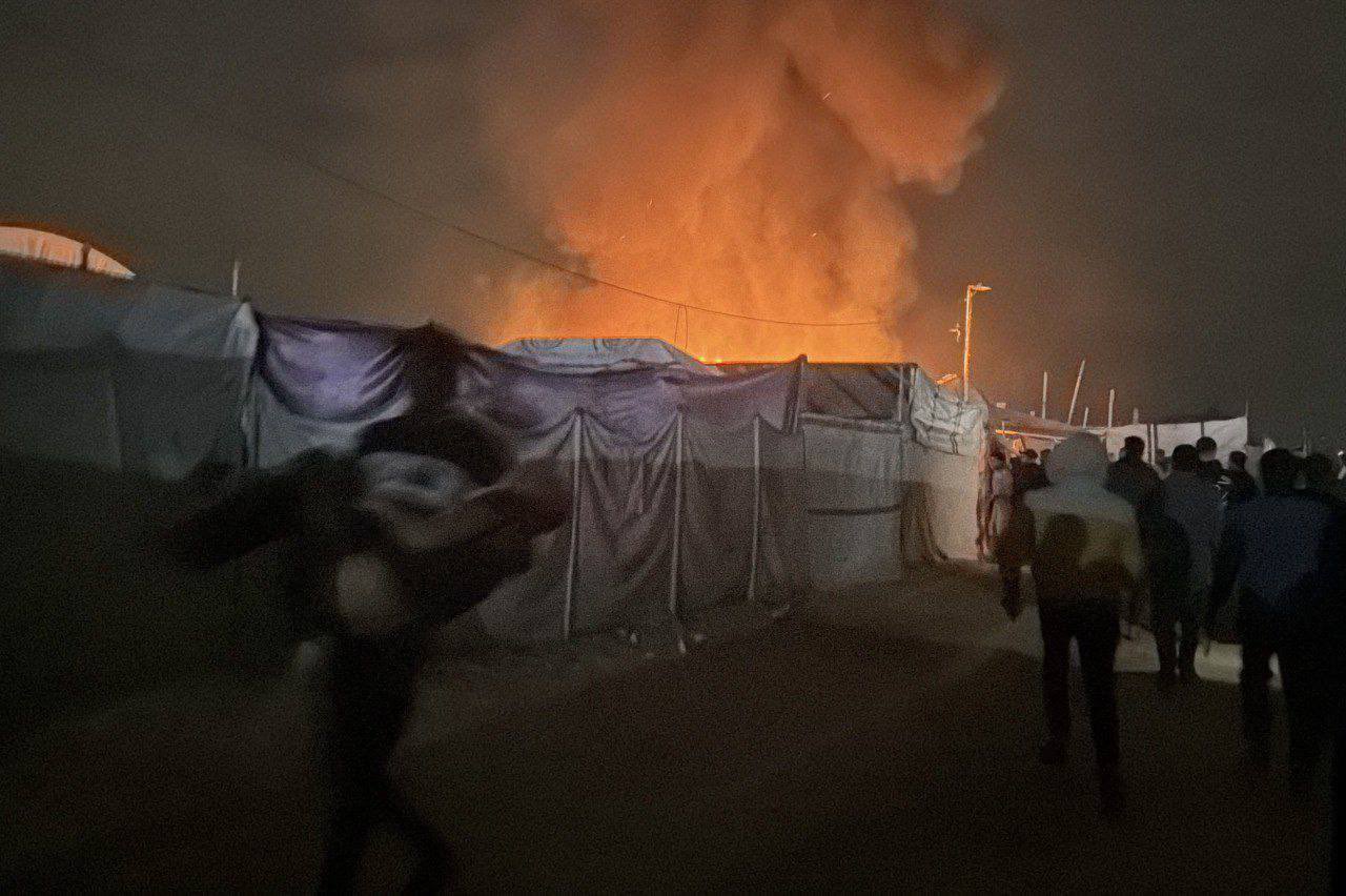 Fires destroy displaced people’s tents after airstrike