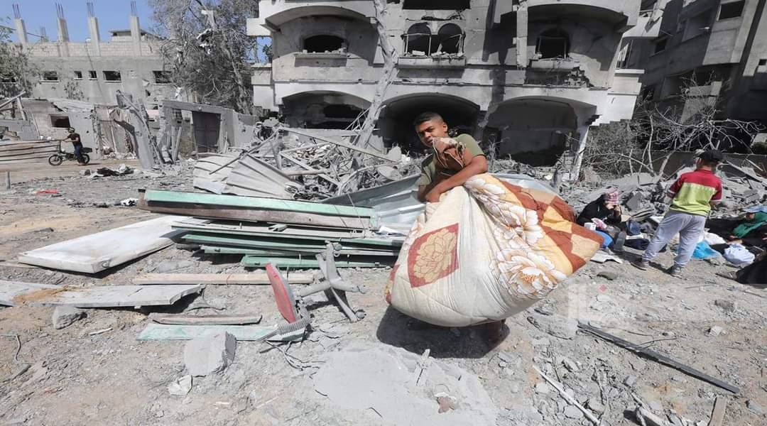 Citizens inspect destruction after airstrikes in Gaza’s Al-Maghazi camp