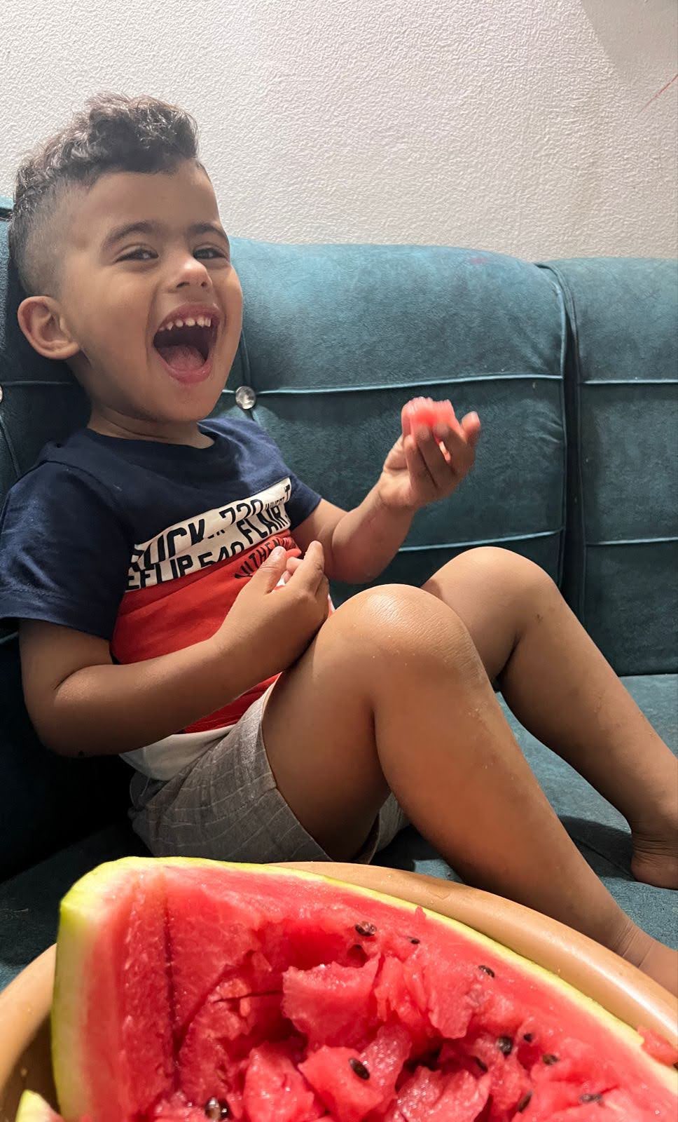 Rakan Enjoying Watermelon at Home in Gaza