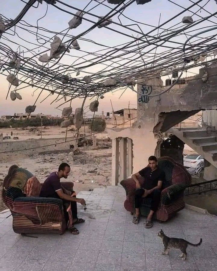Palestinians in Damaged Homes After Israeli Airstrikes
