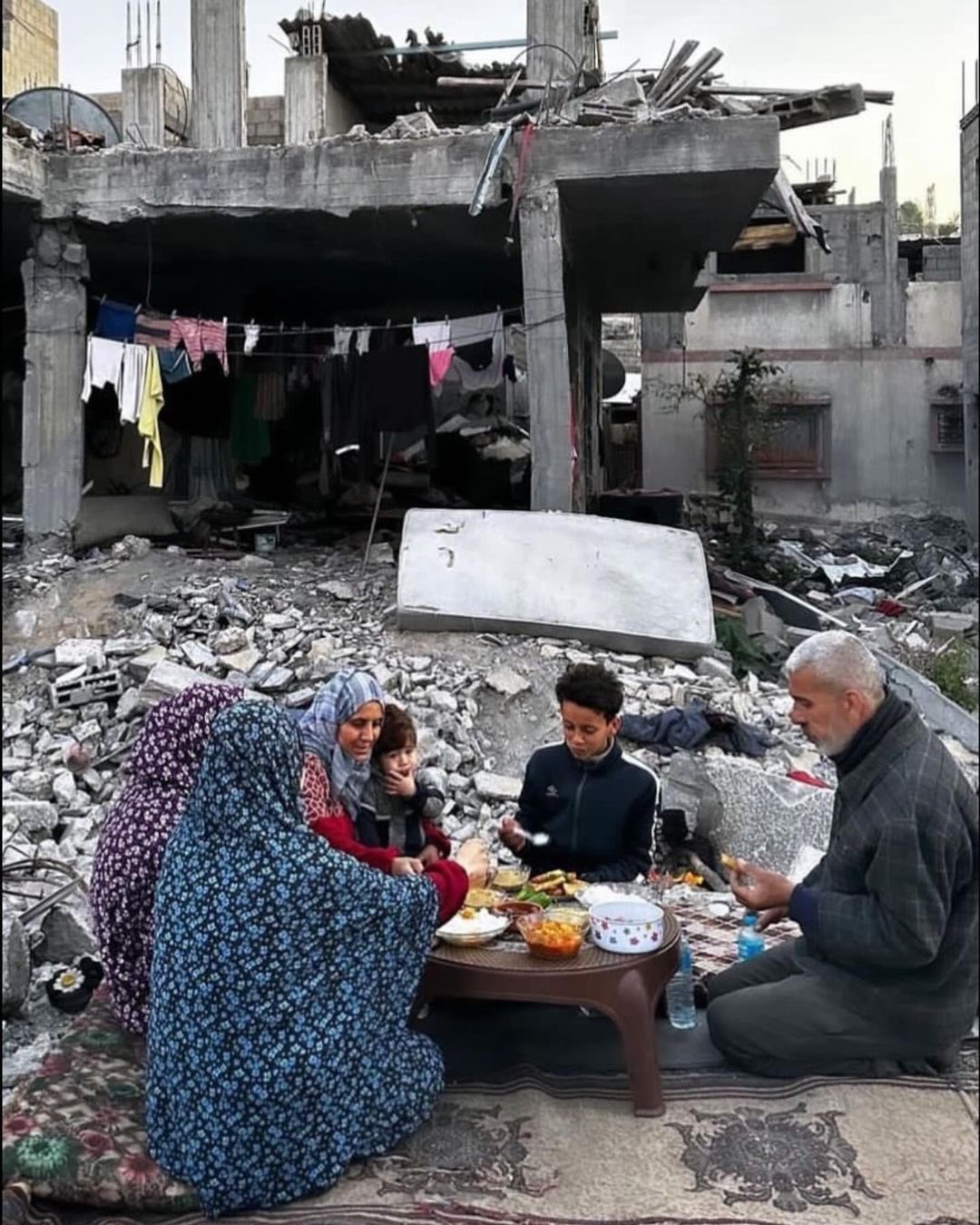 Palestinian Family Breaks Fast Among Gaza Home Rubble