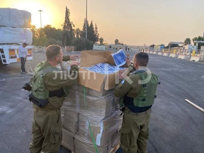 Israeli military inspects humanitarian aid trucks at Rafah crossing