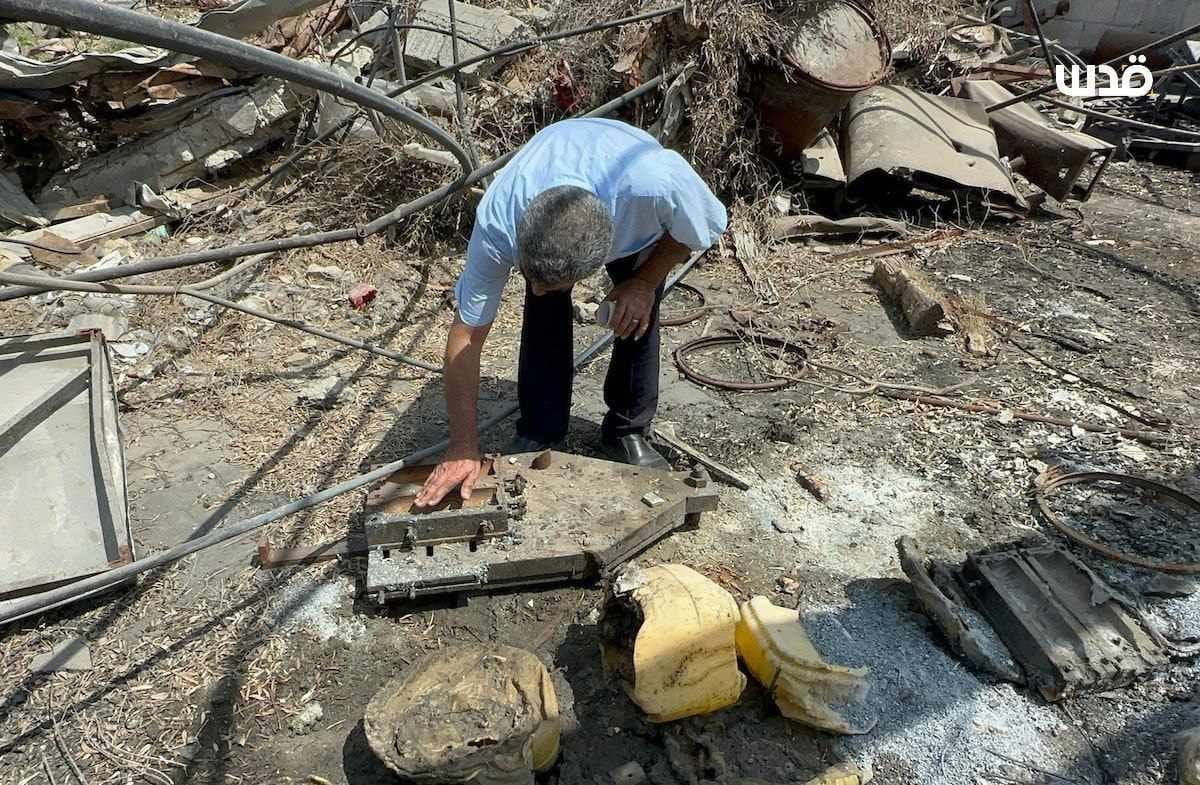 Palestinian Factory Owner Inspects Destroyed Al-Quds Household Cleaners Facility