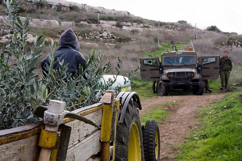 Israeli settlers attack Palestinian farmers, seize tractor