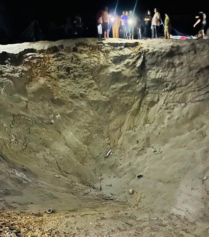 Rocket crater destroys tents in Al Mawasi displacement camp