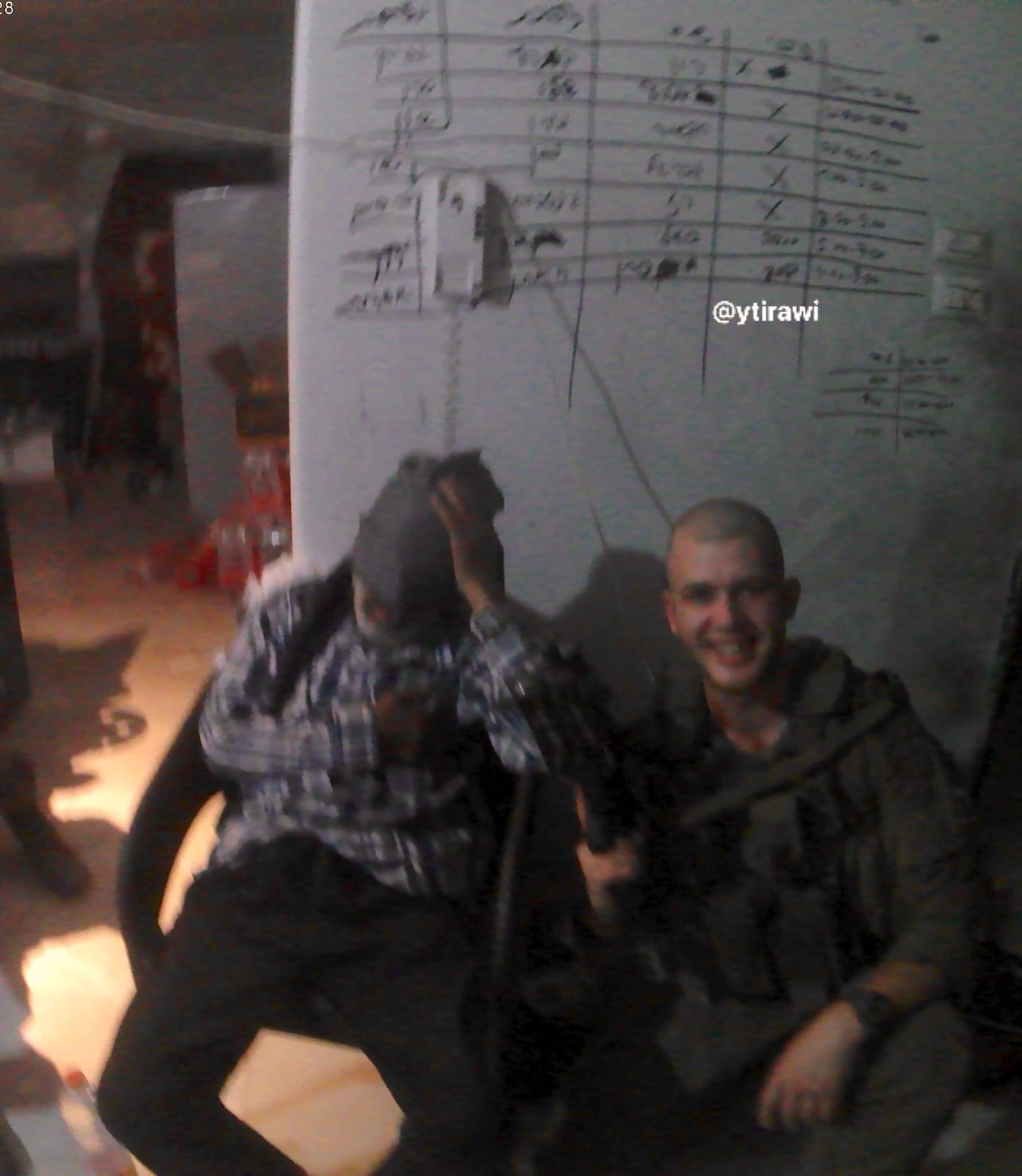 IOF soldier photographed with elderly Palestinian kidnapped from Rafah