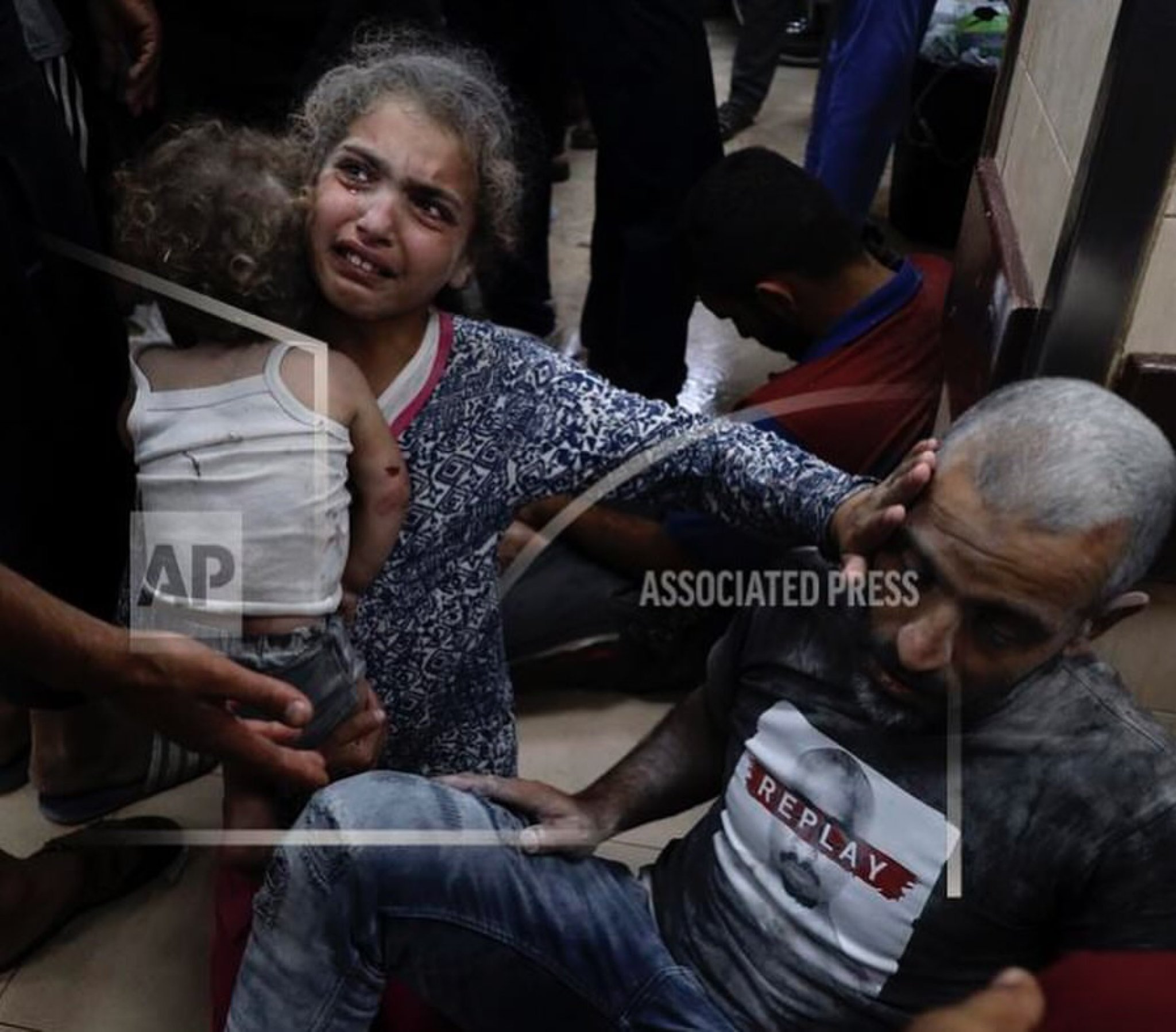 Injured Palestinian Family After Home Attack in Gaza Camp