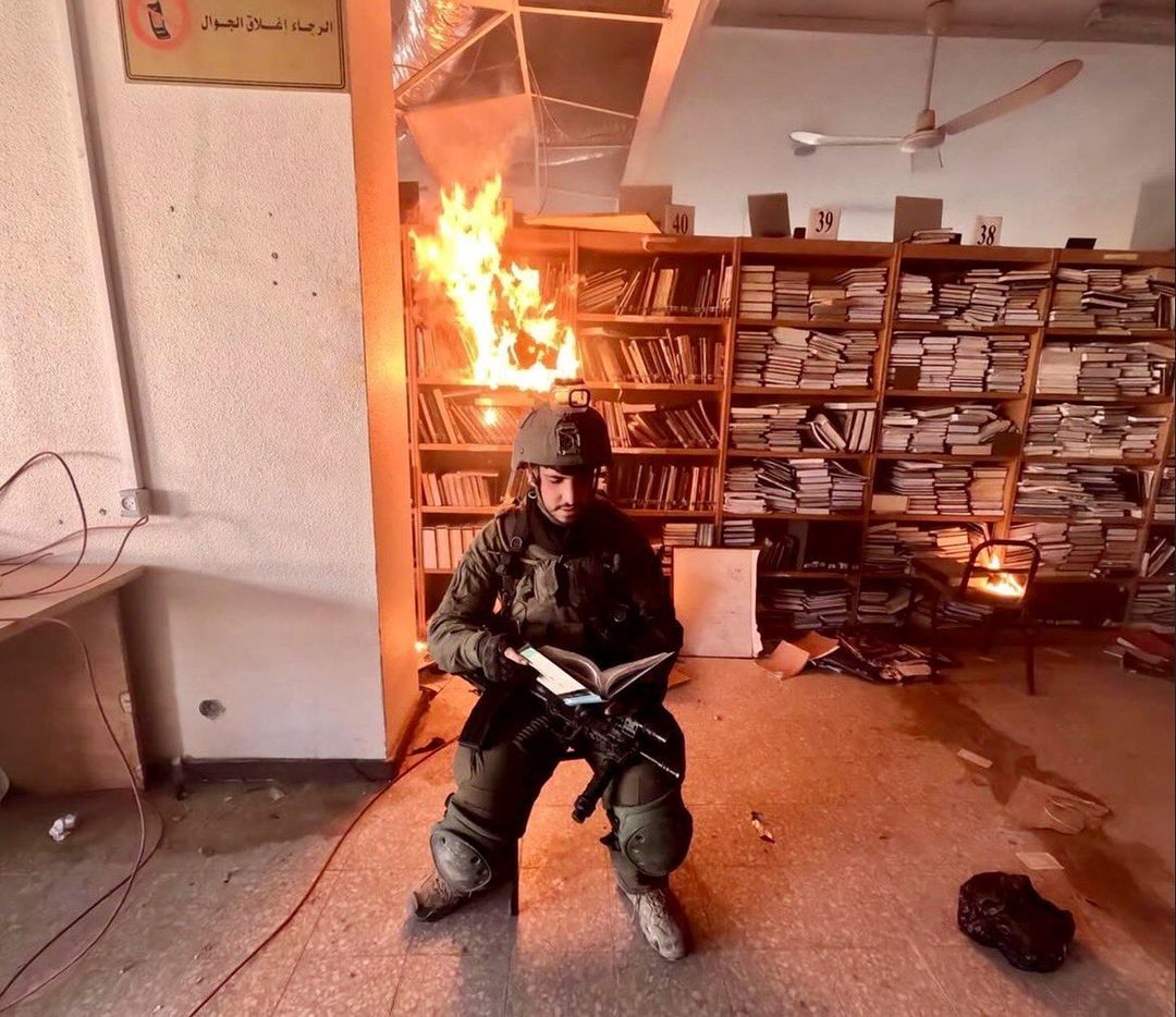 Israeli soldiers film burning of Al-Aqsa University library in Gaza