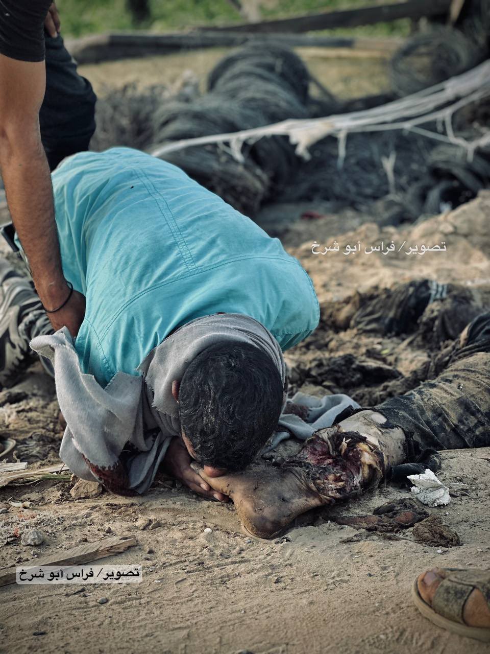 Gaza bombing victim: father mourns son’s remains