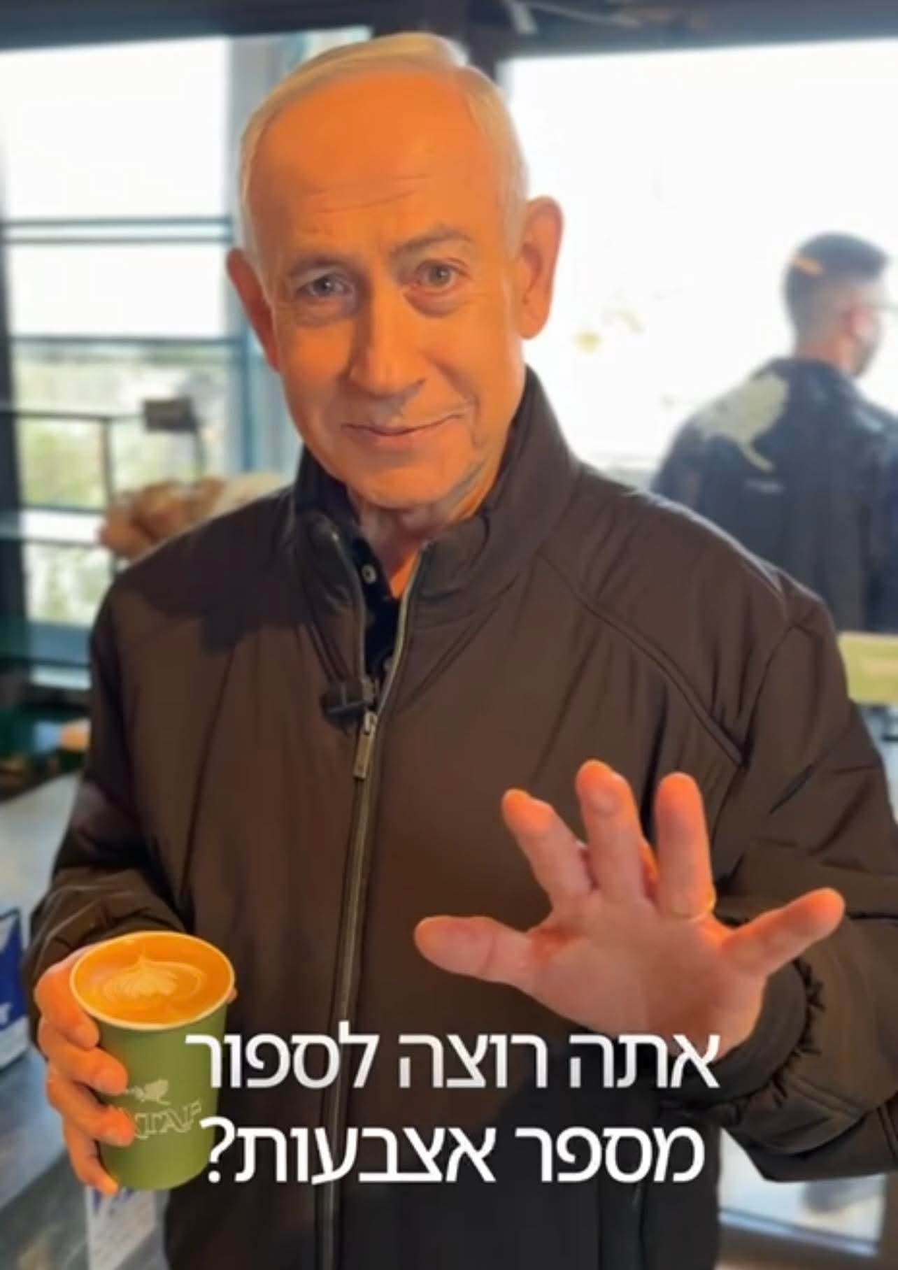 Netanyahu Video: Alive, Drinking Coffee, Showing Fingers