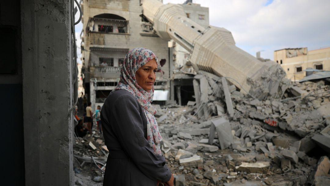 Palestinians inspect destruction at Abed Allah Azzam Mosque in Nusierat