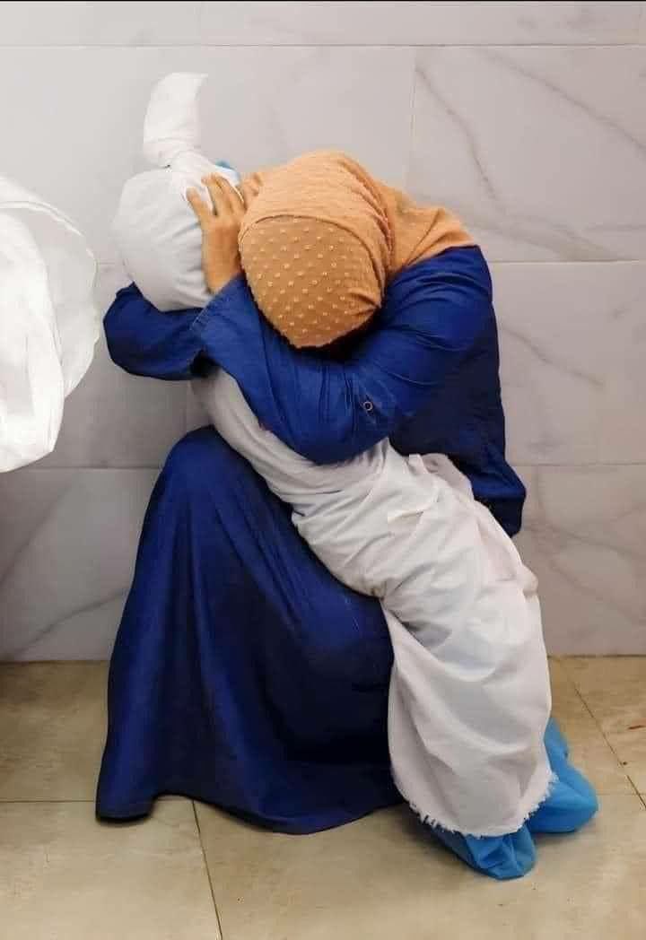 Palestinian Mother Embraces Child Killed in Israeli Gaza Airstrike