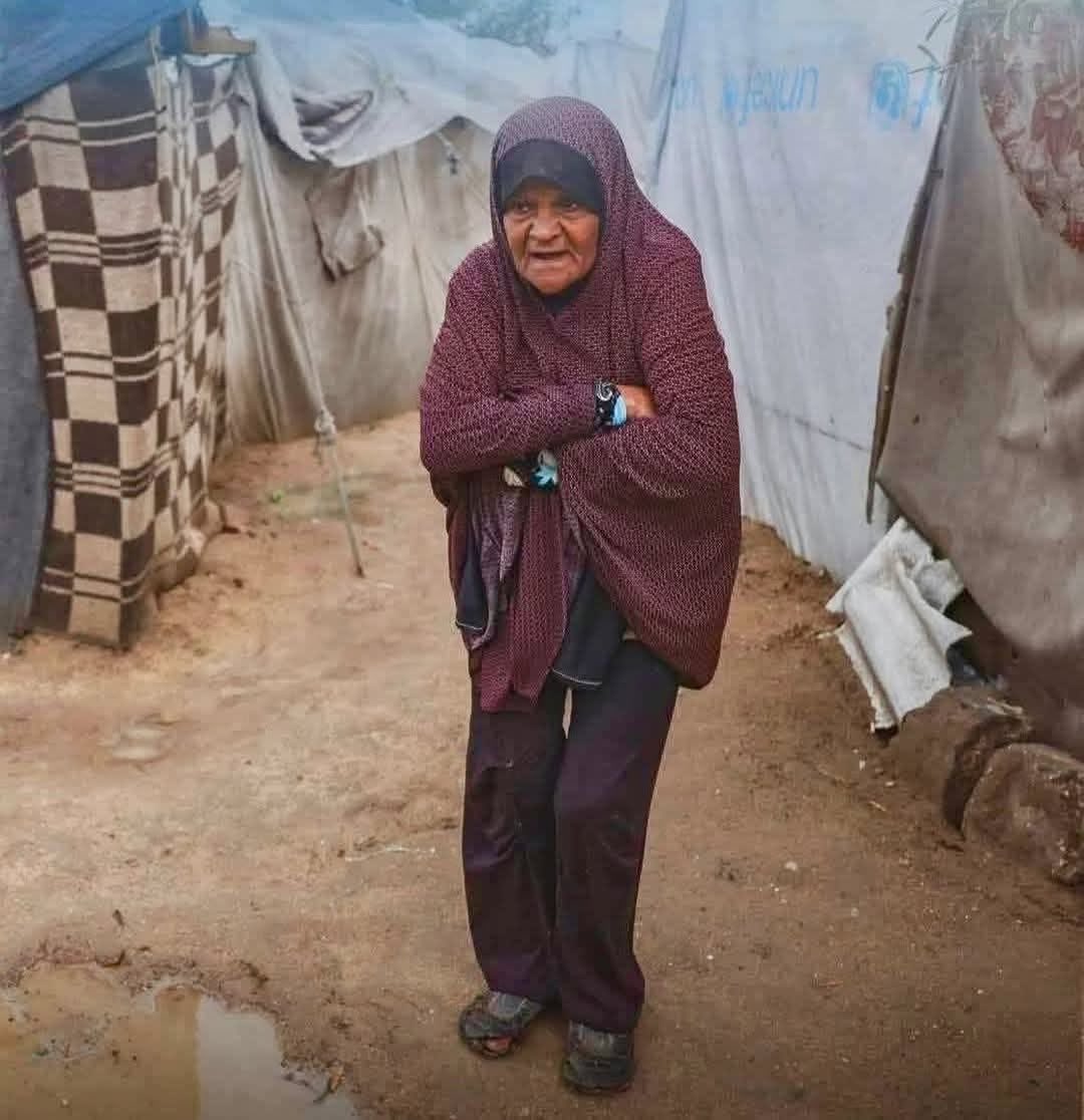 Elderly Palestinian woman shivers alone in Gaza cold