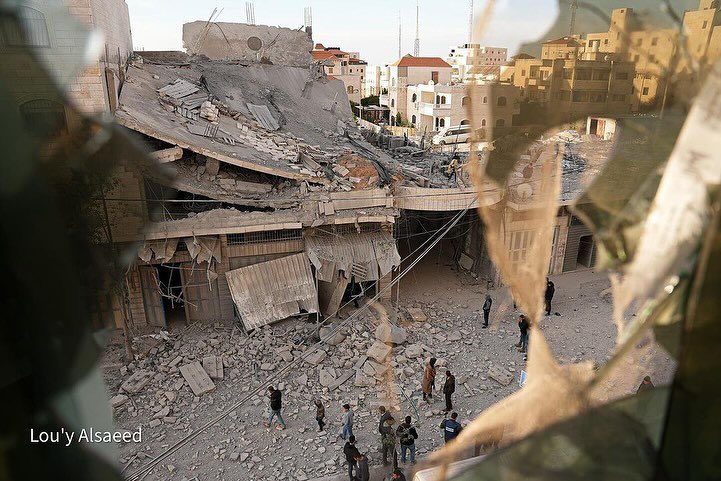 Palestinians inspect destroyed home in Hebron
