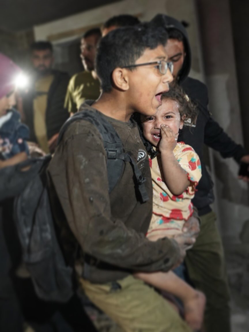 Terrified children after airstrikes hit Rimal, Gaza City