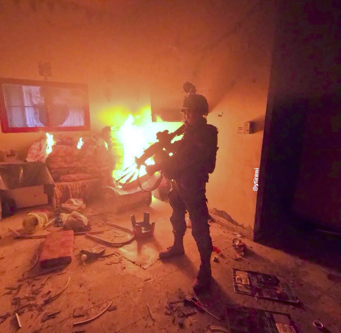 IOF Soldier Posing in Burning Palestinian Home Gaza
