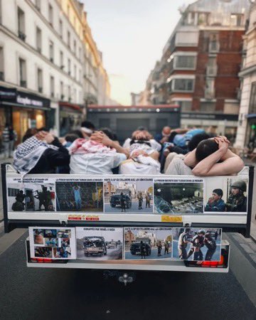 Paris activists simulate Israeli war crimes against Palestinian prisoners