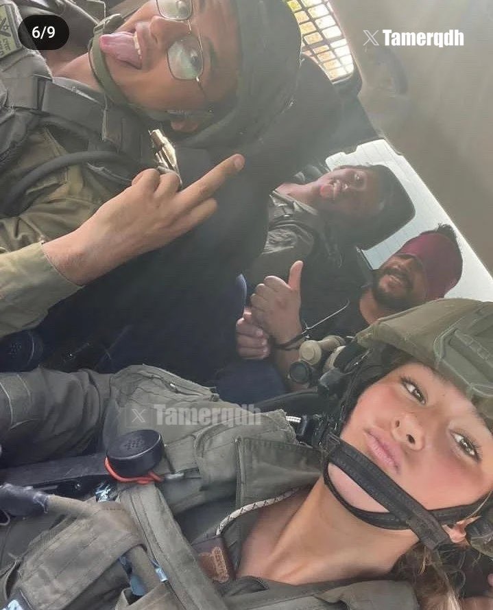 Israeli Soldiers Photograph Detained Palestinian Young Man