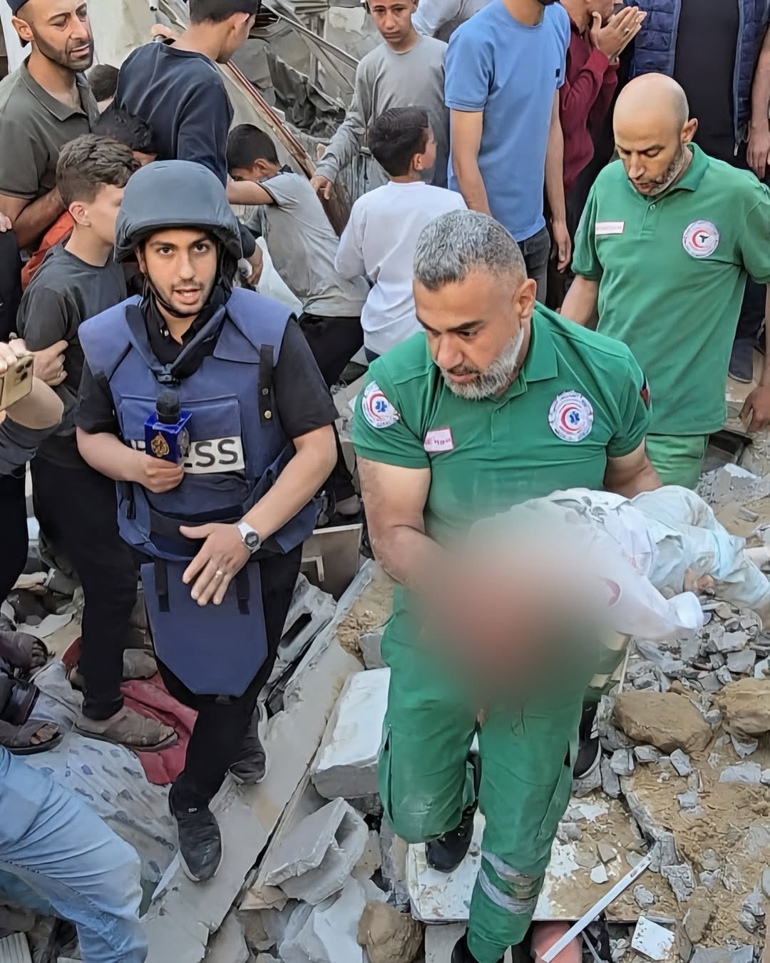 Infant and children pulled from rubble in Jabalia al-Balad