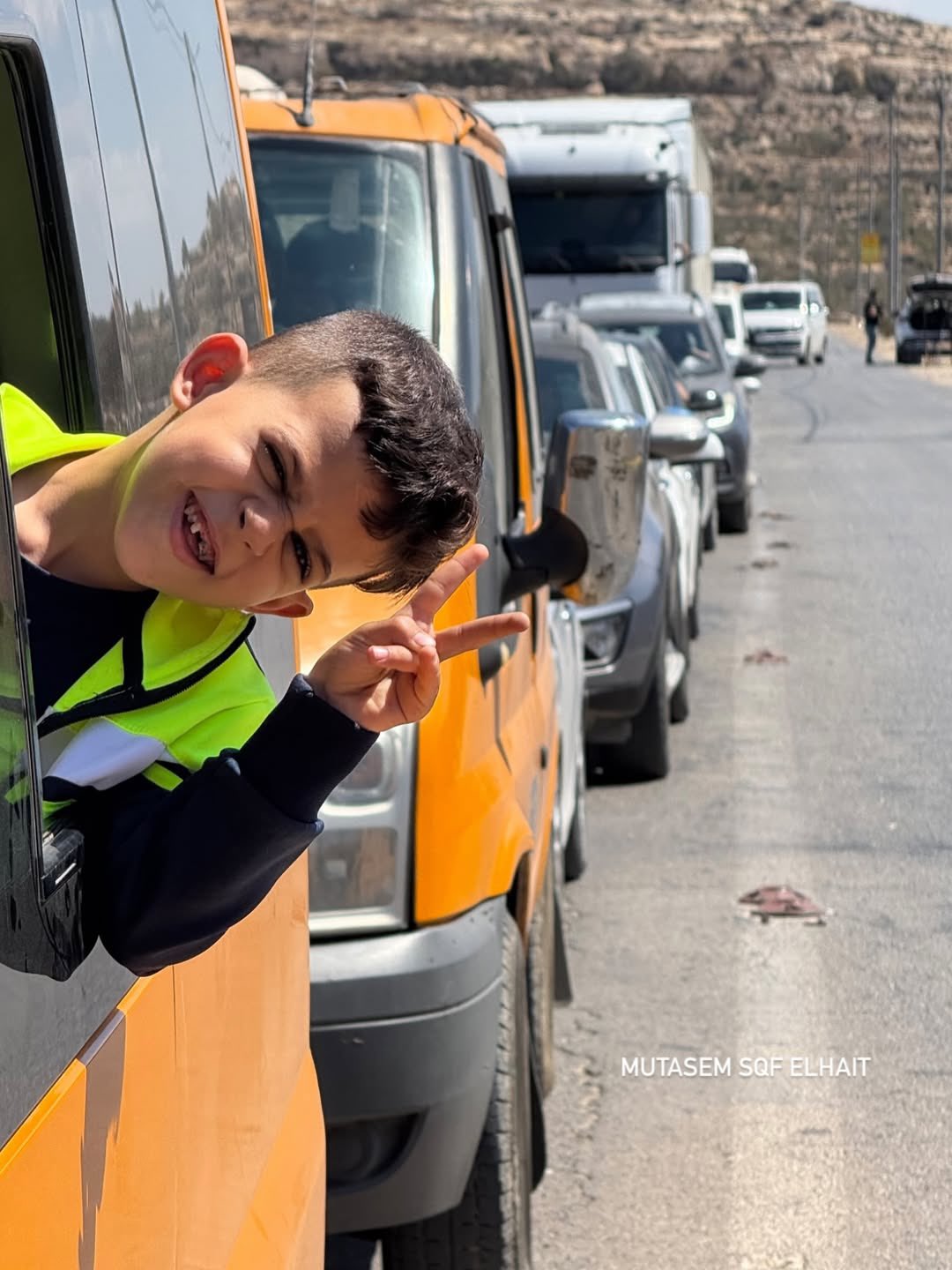 Palestinian Child Victory Sign at West Bank Checkpoint