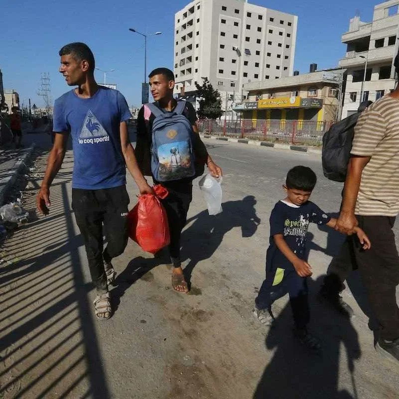 Palestinian Family Flees Gaza City Amid Israeli Bombing and Invasion