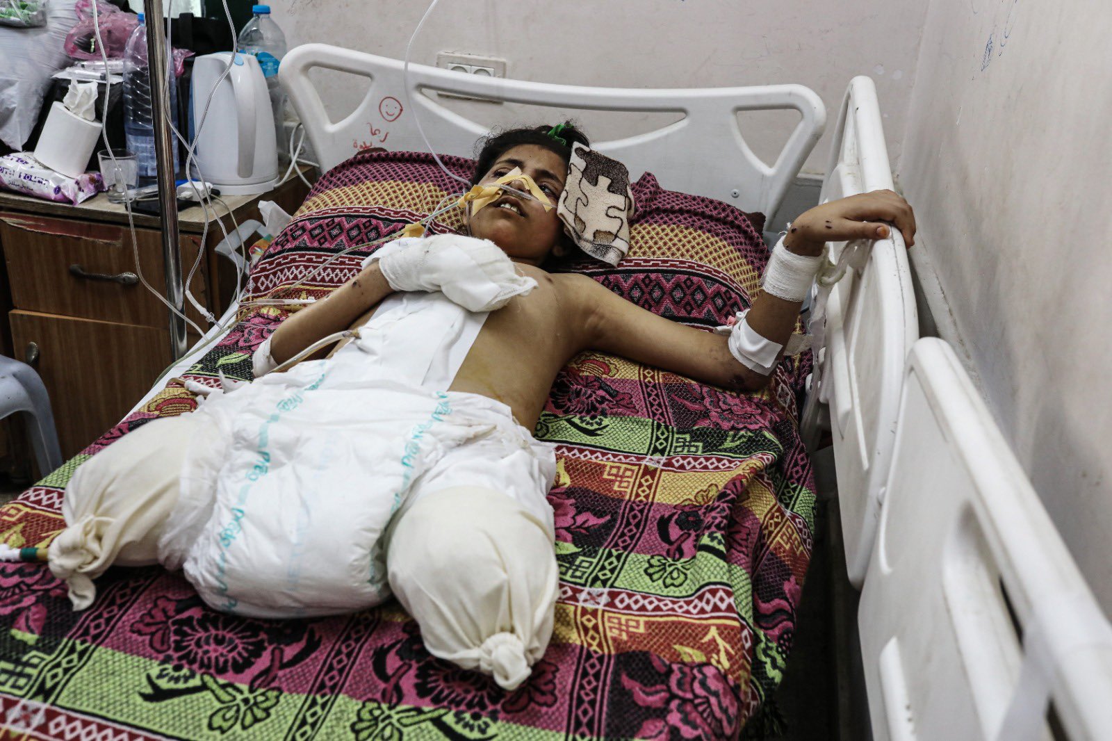Child wounded in Israeli school bombing, family killed
