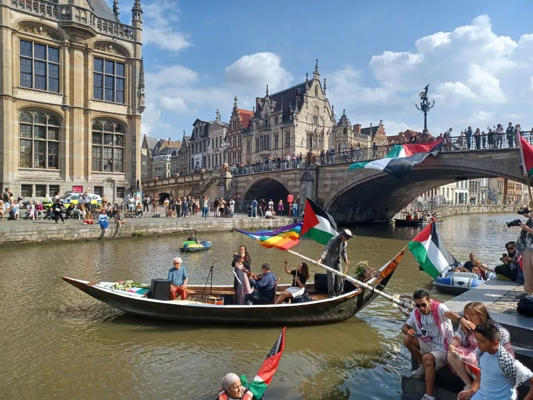 Palestinian flag displayed above river in Gent solidarity protest