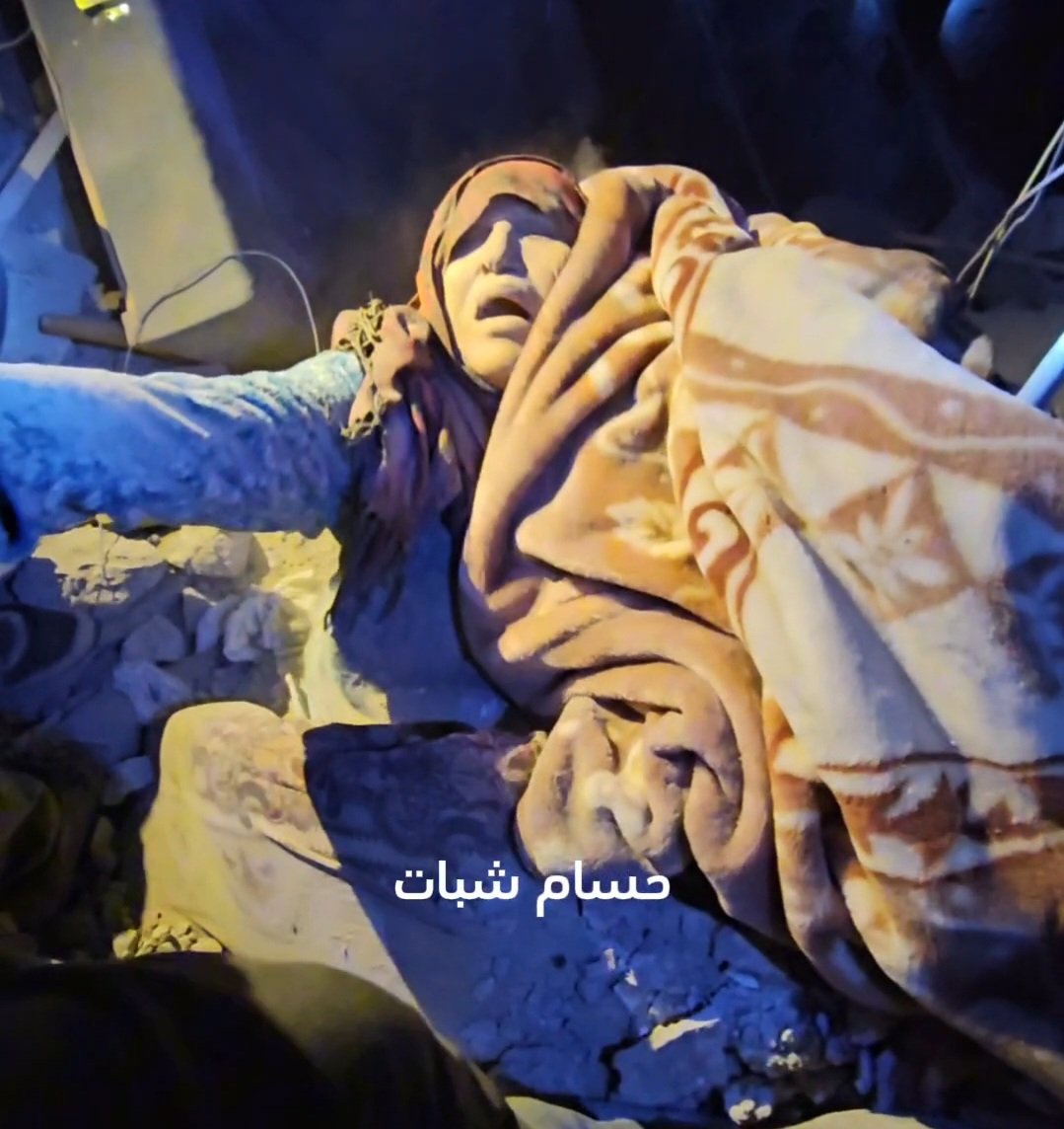 Woman Dies Reading Quran with Blood on Holy Text