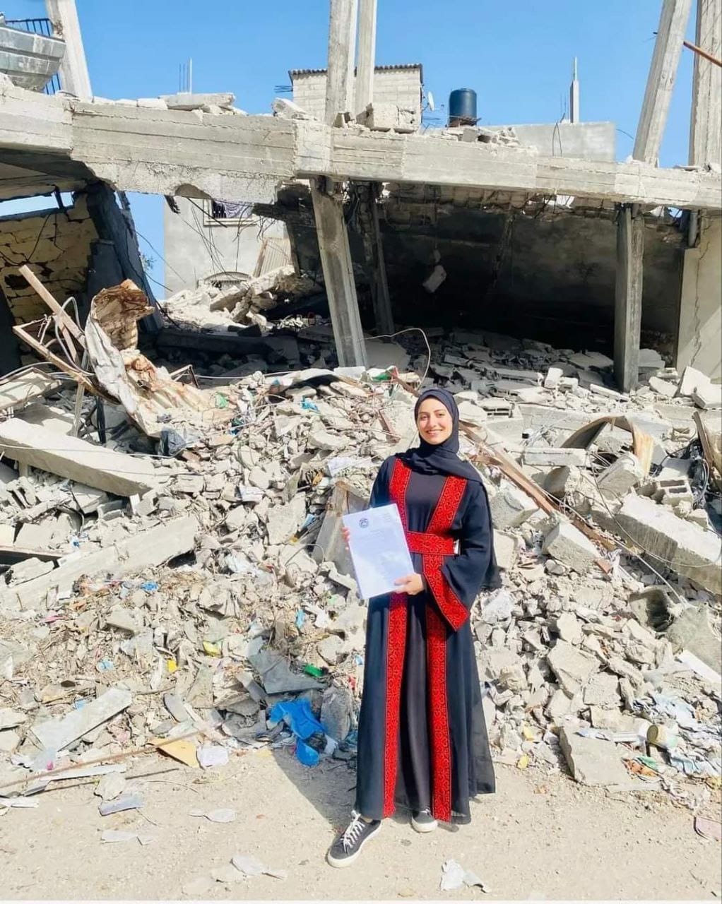 Displaced Gaza girl presents graduation project in refugee camp