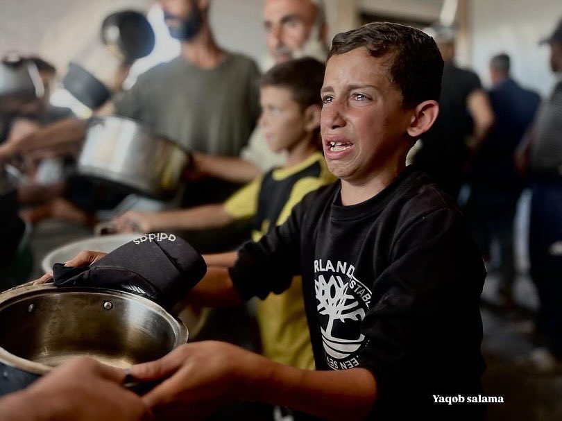 Child struggles for food amid blockade and famine crisis