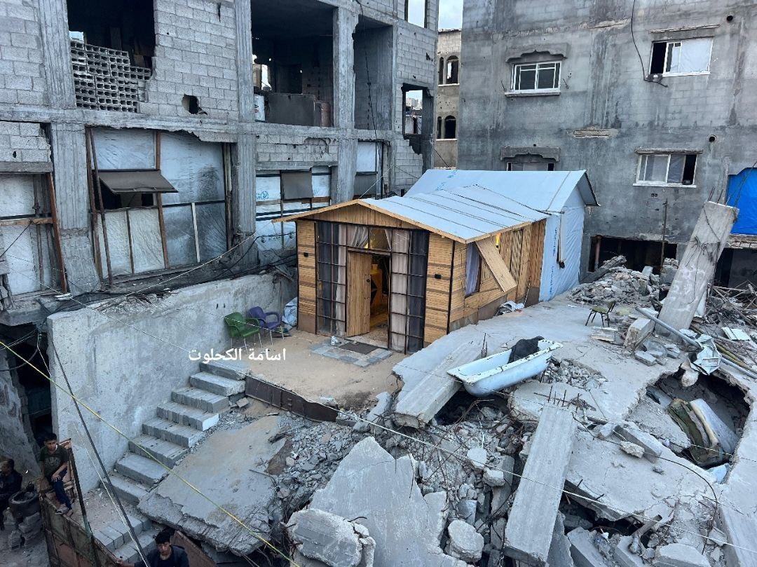 Palestinian Family Shelters in Ruins of Destroyed Home