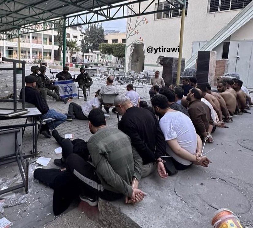 Israeli soldiers share photos of detained Palestinians from refugee shelters