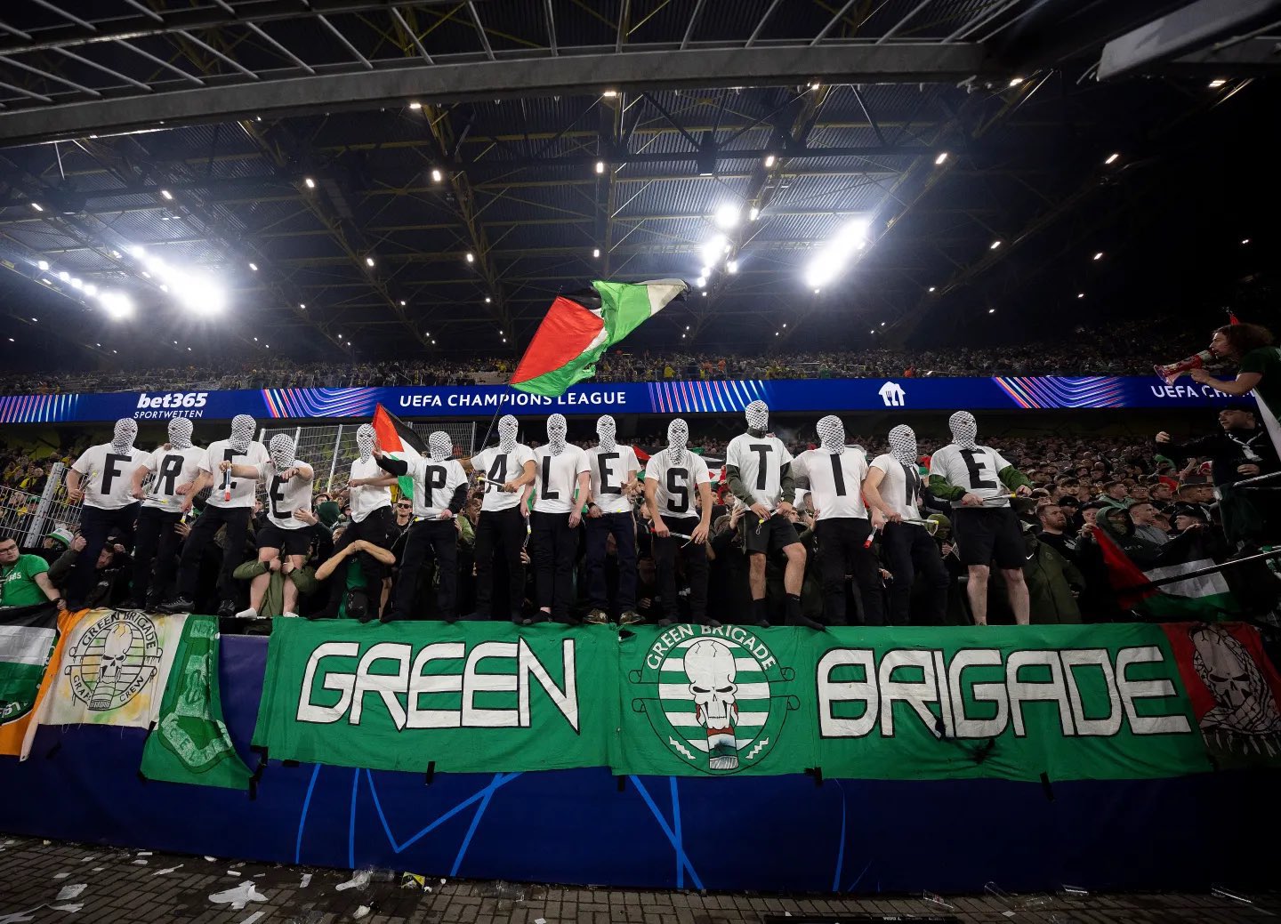 Celtic fans show support for Palestine and Lebanon at Dortmund