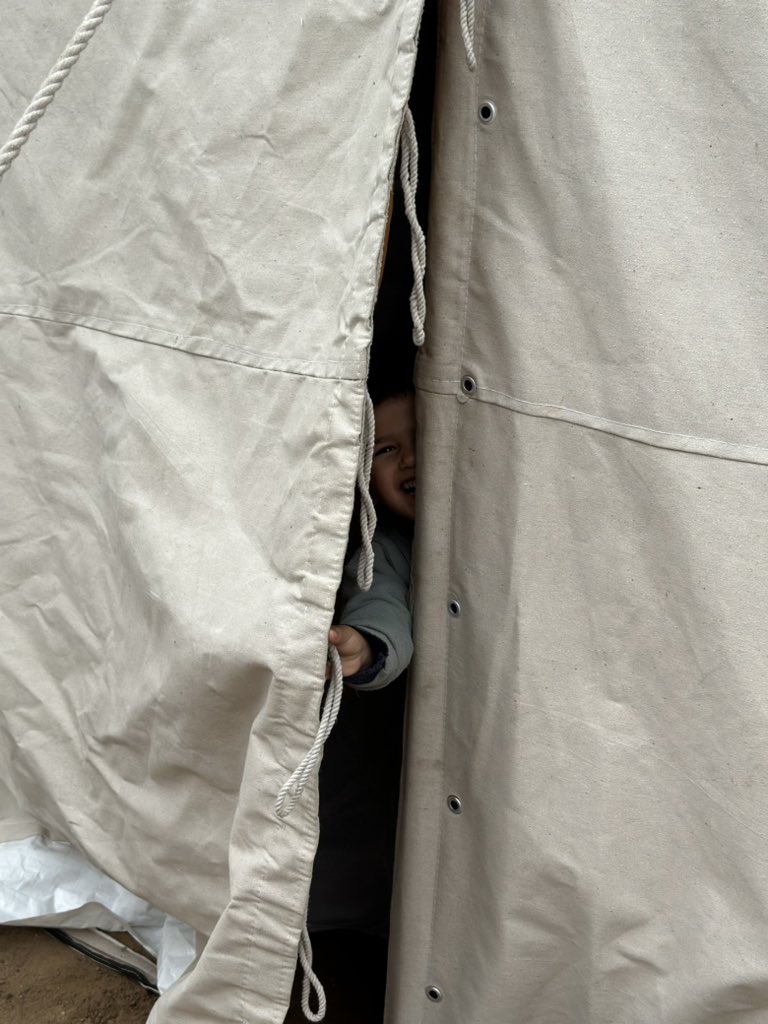 Kinan Checks His New Tent in Gaza