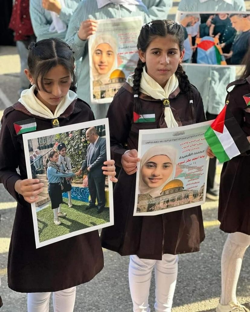 School girls honor slain classmate Bana Baker at school year opening
