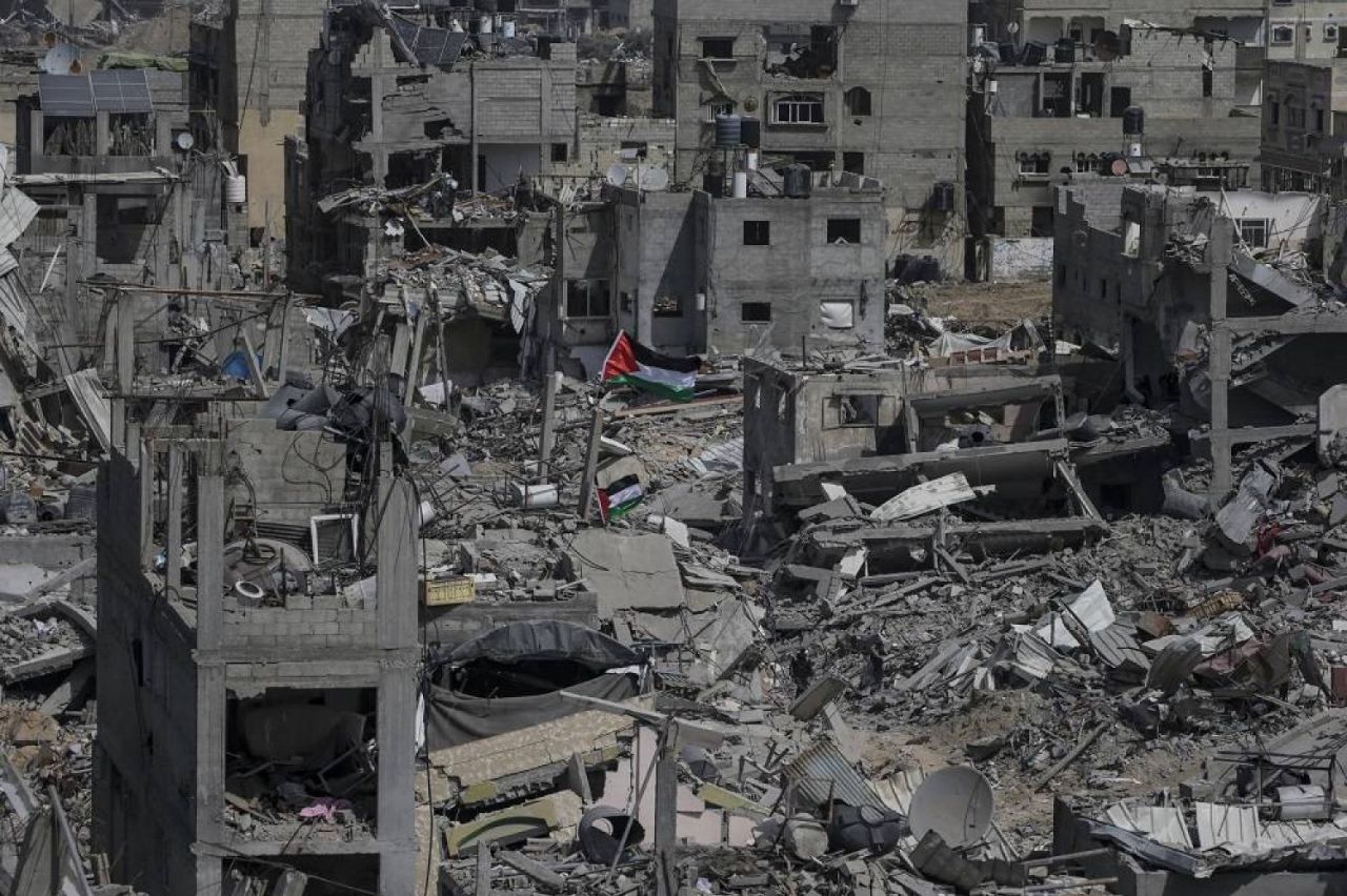 Palestinian Flag Over Khan Yunis Destruction
