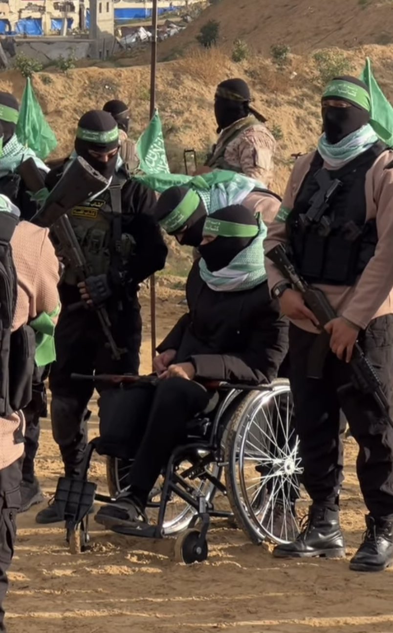 Wheelchair-bound soldier transfers Israeli prisoner remains with comrades