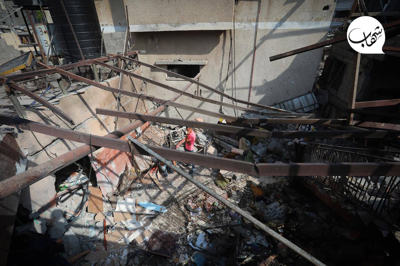 Palestinians Survey Destruction from Israeli Airstrike in Al-Maghazi Camp