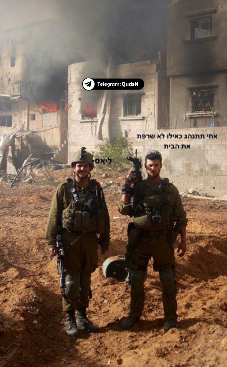 Israeli soldiers photographed at destroyed Palestinian homes in Gaza