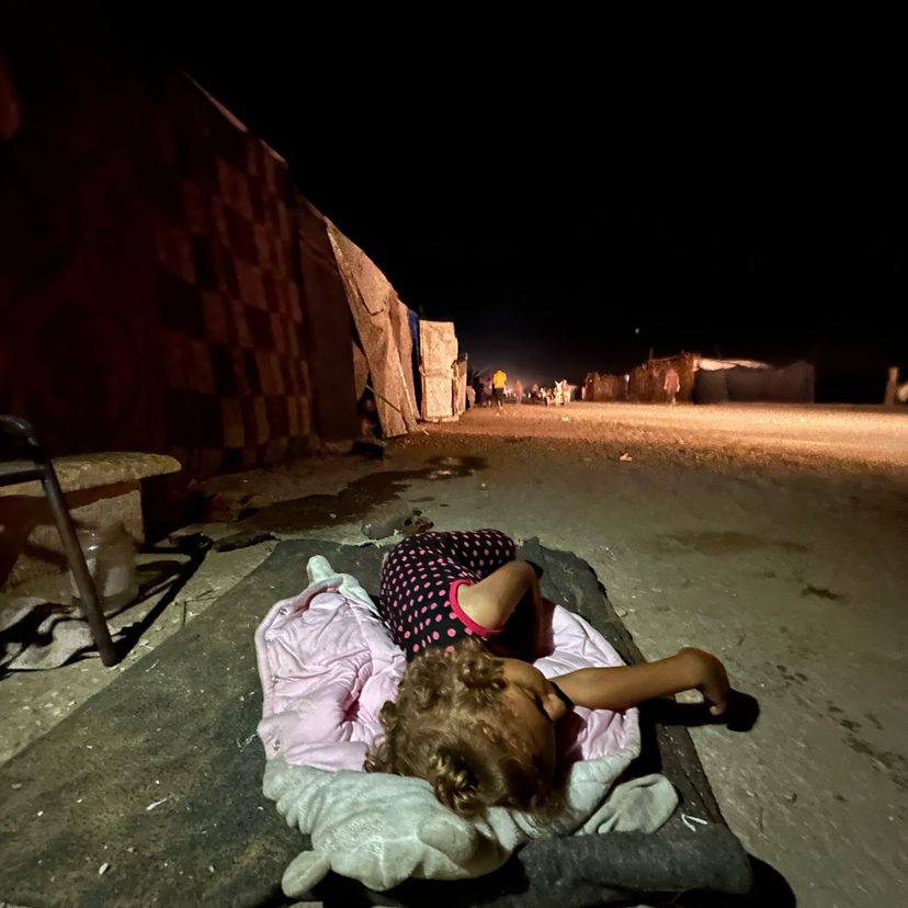 Displaced Palestinian Girl Sleeps on Street Due to Overcrowded Tent
